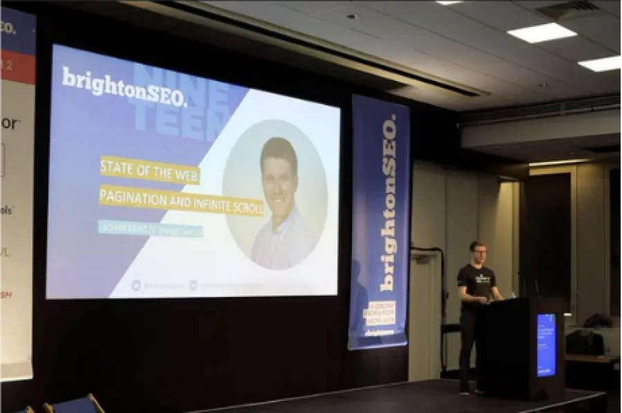 Adam Gent speaking at BrightonSEO 2019 on pagination and infinite scroll