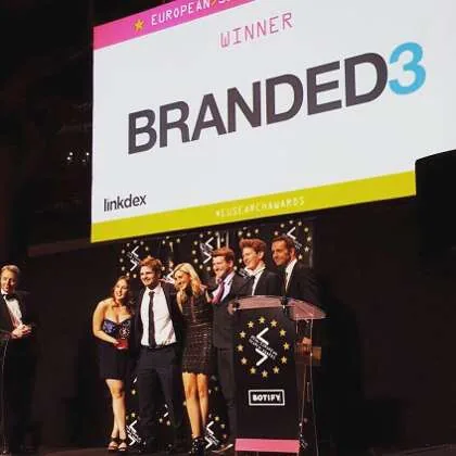 Adam Gent on stage as Branded3 wins at the European Search Awards